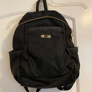 Great condition black and gold backpack
